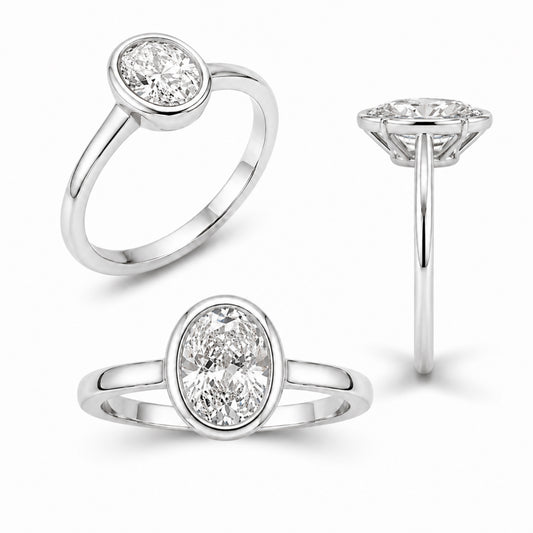 1.00-6.00 Carat T.W. Oval-cut Lab Grown Diamond (F/VS+) 14K Gold Bezel Set Ring