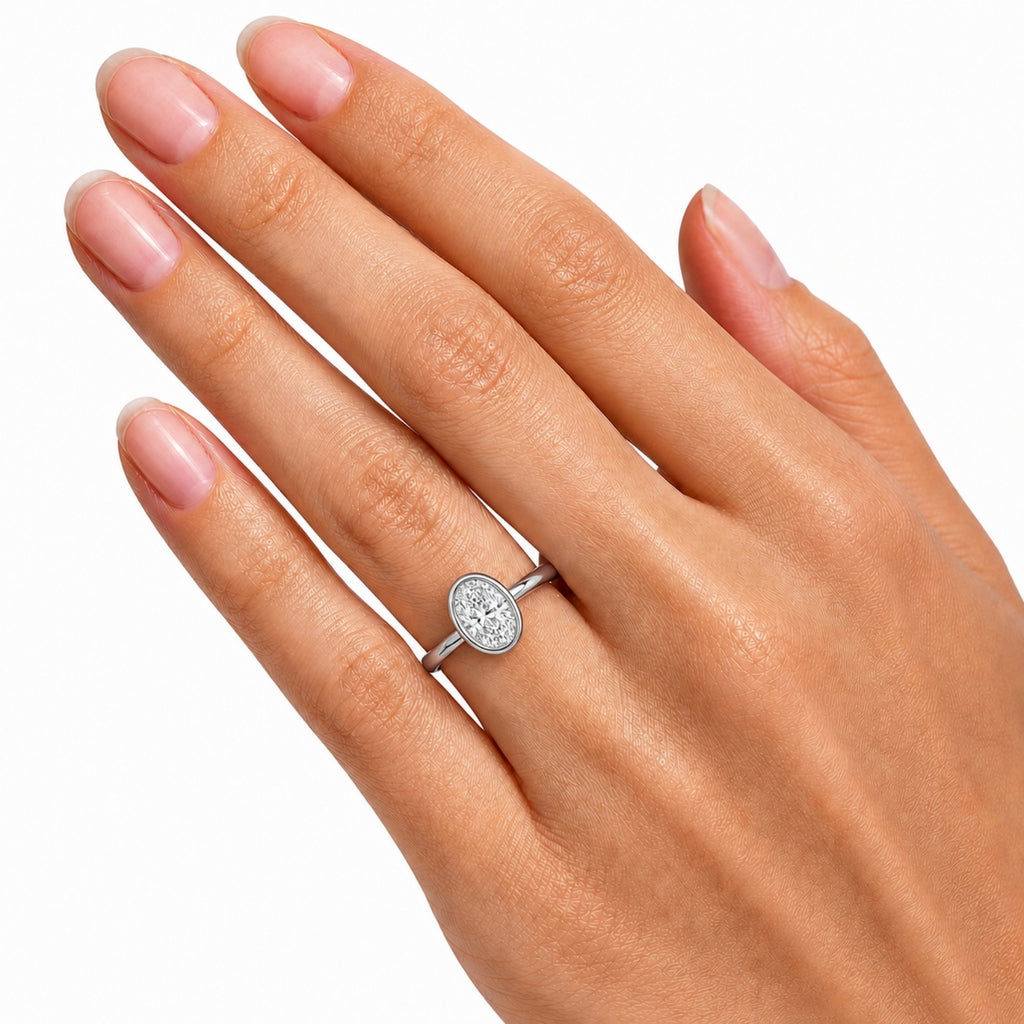 Venturant 1.00-6.00 Carat T.W. IGI certified Oval-cut Lab Grown Diamond (D/VS+) 14K Gold Bezel Set Ring
