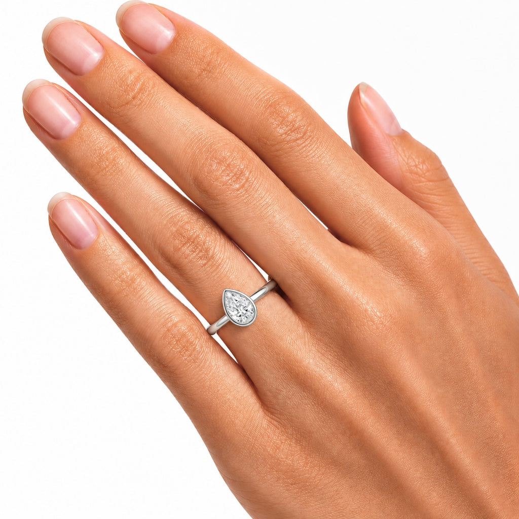 Venturant 1.00-6.00 Carat T.W. IGI certified Pear-cut Lab Grown Diamond (D/VS+) 14K Gold Bezel Set Ring