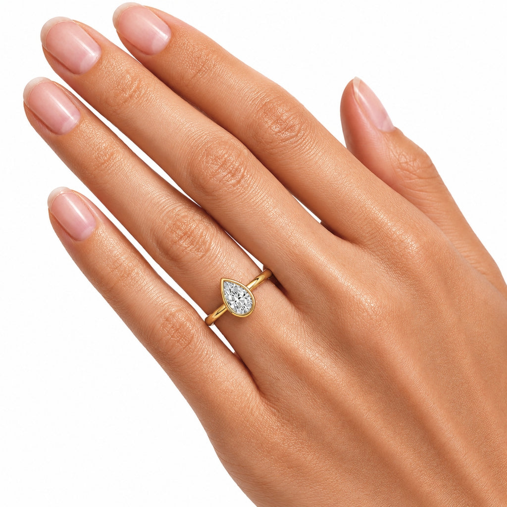 Venturant 1.00-6.00 Carat T.W. IGI certified Pear-cut Lab Grown Diamond (D/VS+) 14K Gold Bezel Set Ring